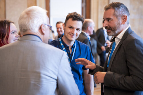 Participants chatting after opening ceremony