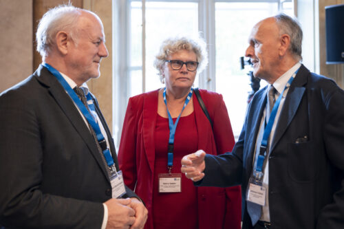 Participants chatting after opening ceremony