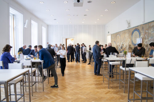 Participants chatting after opening ceremony