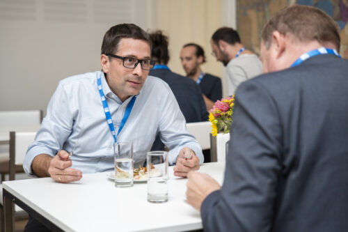 Participants chatting after opening ceremony