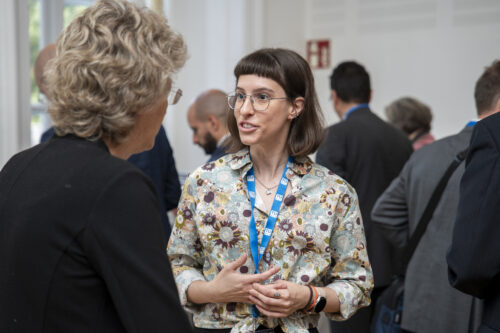 Participants chatting after opening ceremony