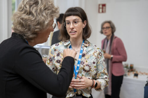 Participants chatting after opening ceremony