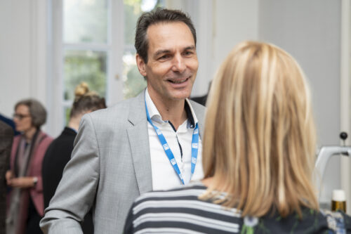 Participants chatting after opening ceremony