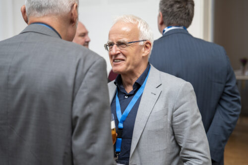 Participants chatting after opening ceremony