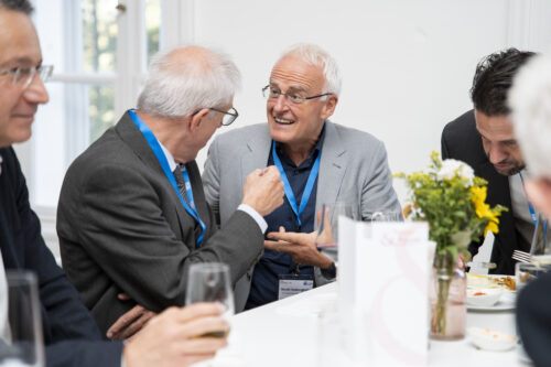 Participants chatting after opening ceremony