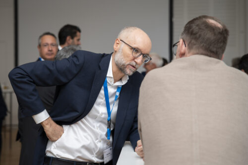 Participants chatting after opening ceremony