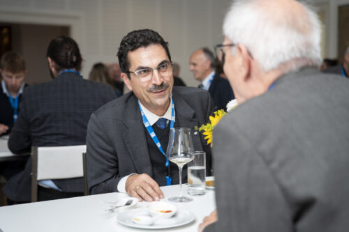 Participants chatting after opening ceremony