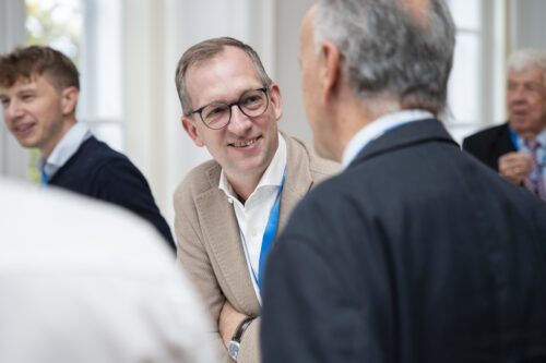 Participants chatting after opening ceremony