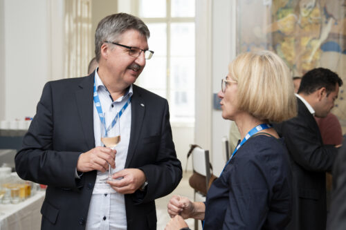 Participants chatting after opening ceremony