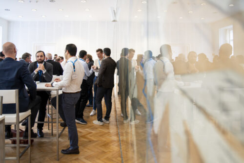 Participants chatting after opening ceremony