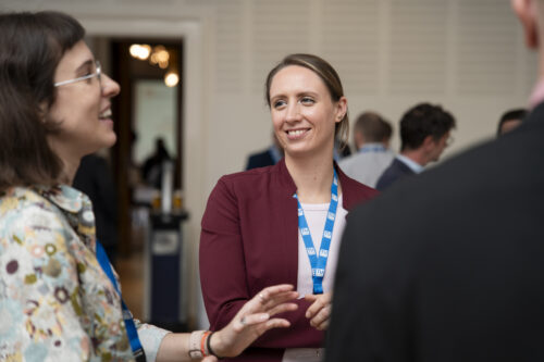 Participants chatting after opening ceremony