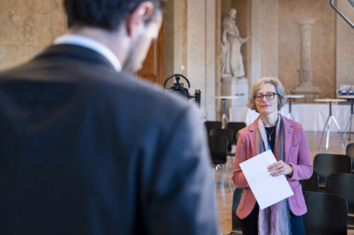 Karin Hofmann posing a question during the interview