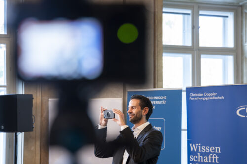 Josef Füssl making a photo during the interview