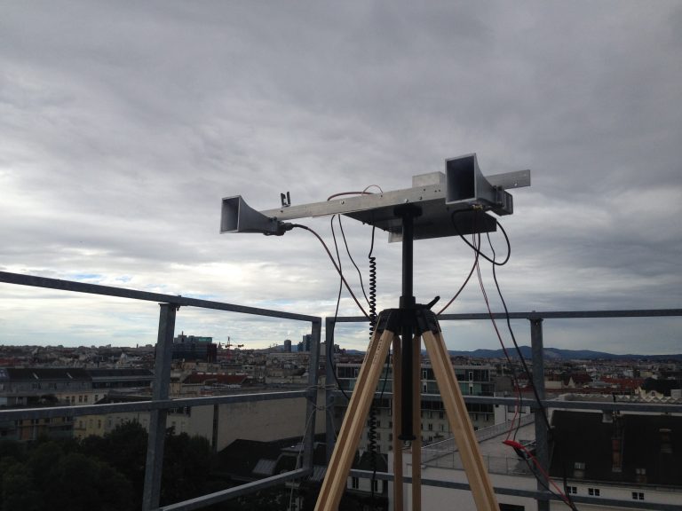 A prototype transceiver setup for the 3cm band 10.368-10.370 GHz mounted on the photo tripod on the flat roof of the institute