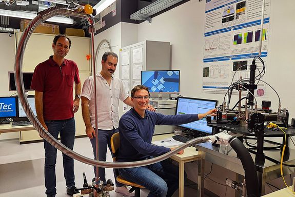 three people in the lab