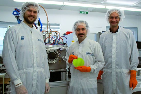 three people in the lab