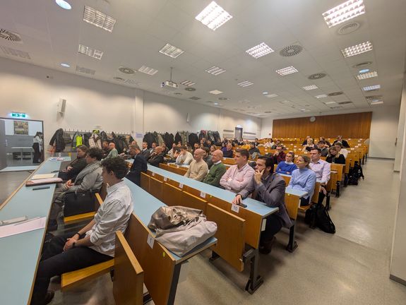 Lecture hall (front view showing participants)