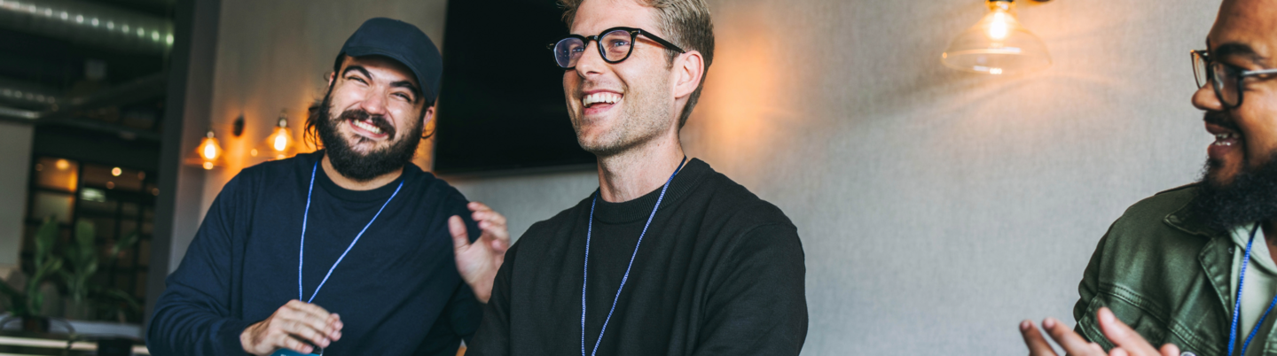 a woman standing on stage with a blurred background