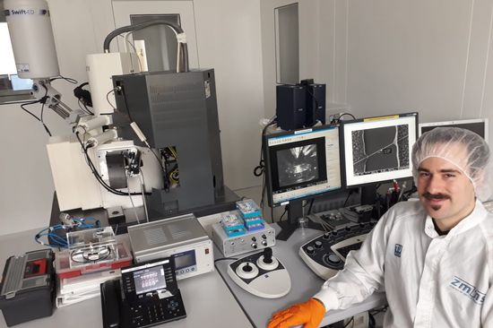 scientist wearing protecitve gear in the lab