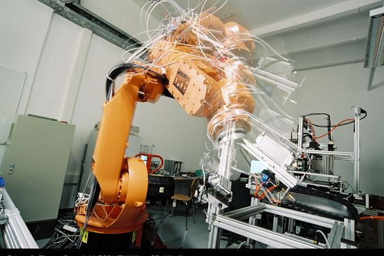 A big orange machine in the laboratory