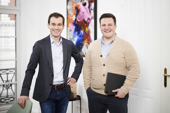 Two men are in the picture, both alumni of the TU Vienna