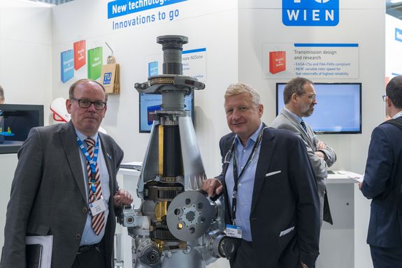 visitor and exhibitor at the TU Wien stand