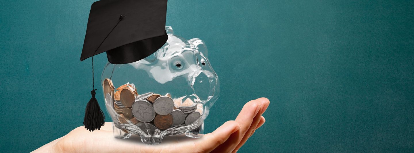 Hand with piggy bank