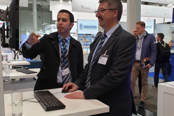 Prof. Dr. Michael Harasek and Dr. Bahram Haddadi Sisakht happily at the TU Wien booth.