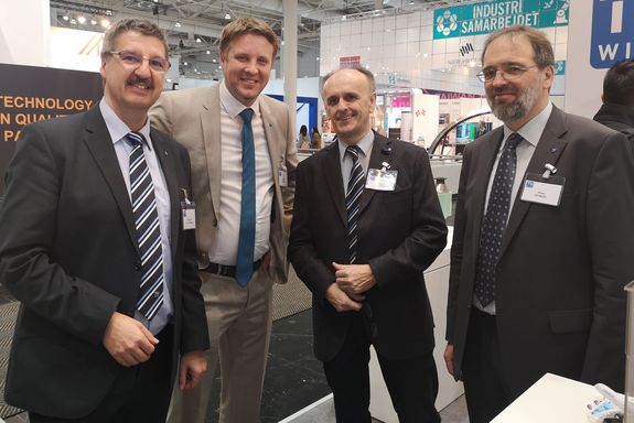 Michael Harasek, Stefan Mueller, Johannes Froehlich, Peter Heimerl Distinguished visitor from vienna vice rektor Fröhlich (middle/right) with Prof.Dr. Michael Harasek (left), Dr. Stefan Müller (middle/left) and Peter Heimerl (right - TU Wien Research Marketing) at the TU Wien stand.
