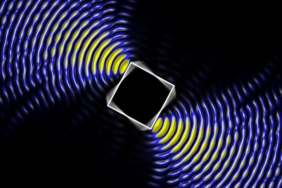 Intensitätsverteilung eines elektrischen Wellenfeldes, das ein wohldefiniertes Drehmoment auf das quadratische Target ausübt. (Download und Verwendung honorarfrei © TU Wien)