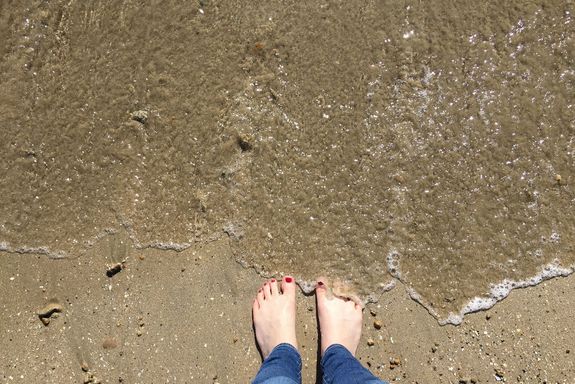 Füße am Strand