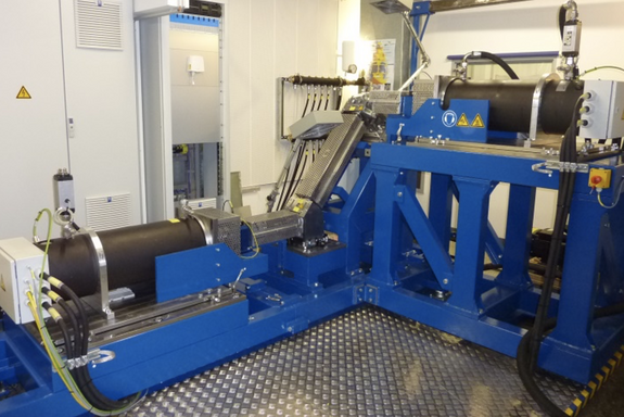 blue test stand for helicopter drive trains within a hall