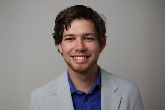 a young man with a suit
