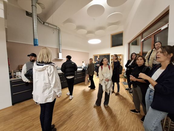 Excursion group in the communal kitchen