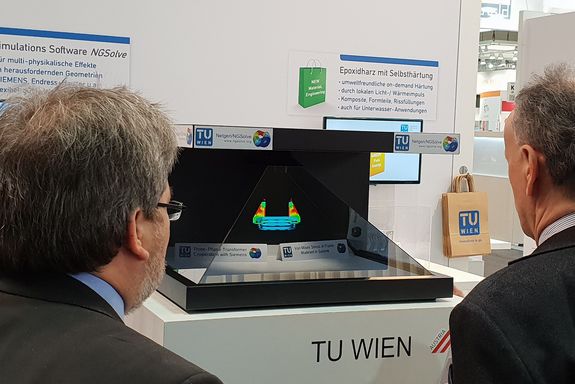 The hologram pyramid showing a simulation of the Netgen/NGSolve softwares functionality.