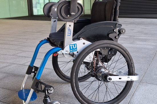 Optimized Handle-Based Device for Continuous Wheelchair Propulsion