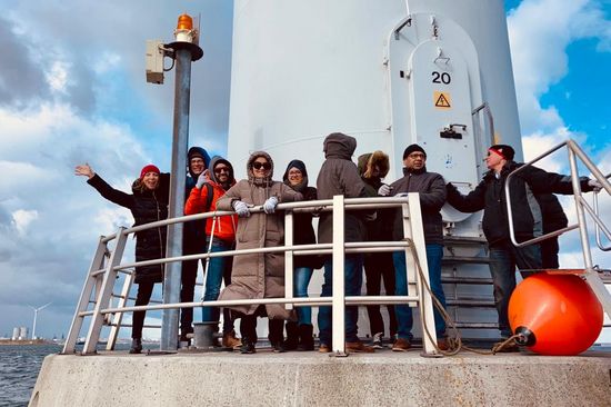 Students on off-shore wind turbine