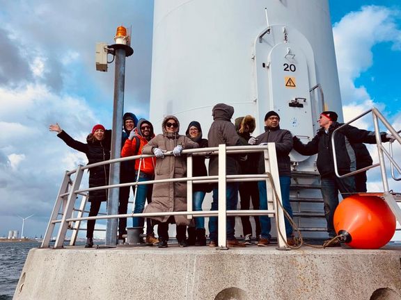 Students on off-shore wind turbine