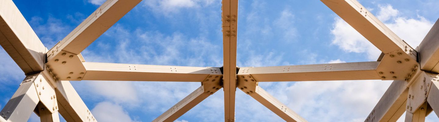 Steal truss in front of a blue sky