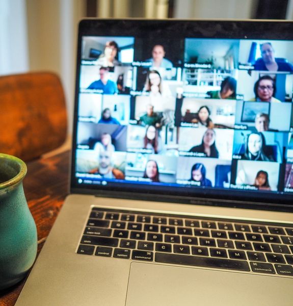 Photo of screen with online meeting