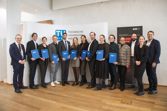 NHB Graduates with their Diplomas