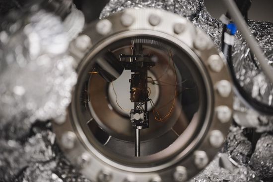 A view through a window into a vacuum chamber