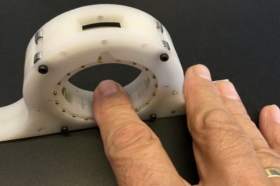 Photo of the Ring-Shaped Portable Braille Device  with link to PDF "Ring-Shaped Portable Braille Device"
