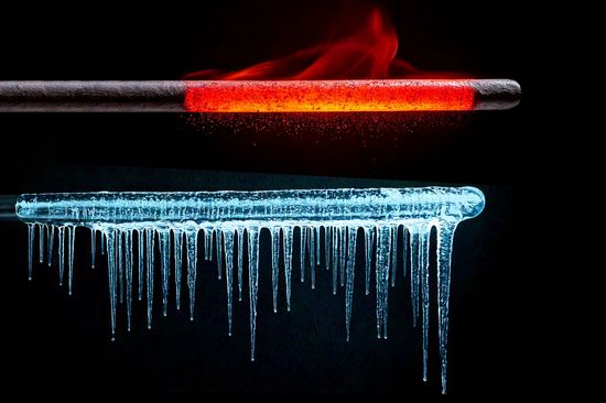 a red hot metal rod, an a second rod covered in icicles