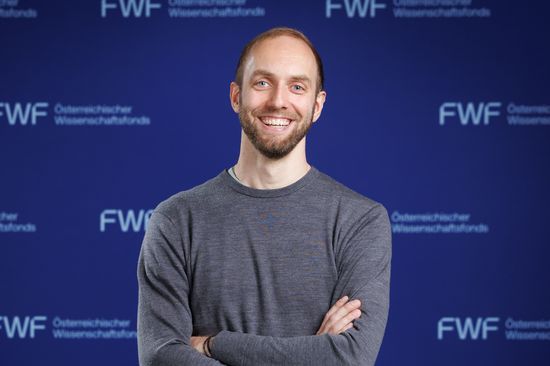 researcher smiling