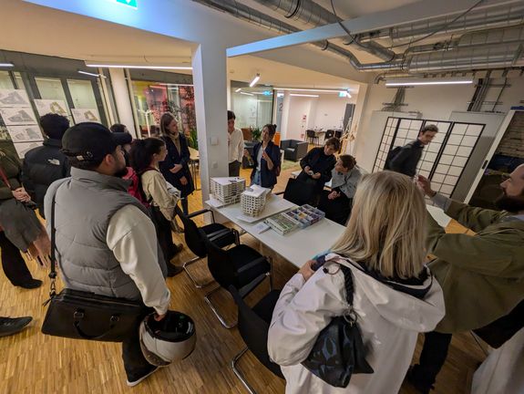 Excursion group looks at architectural model