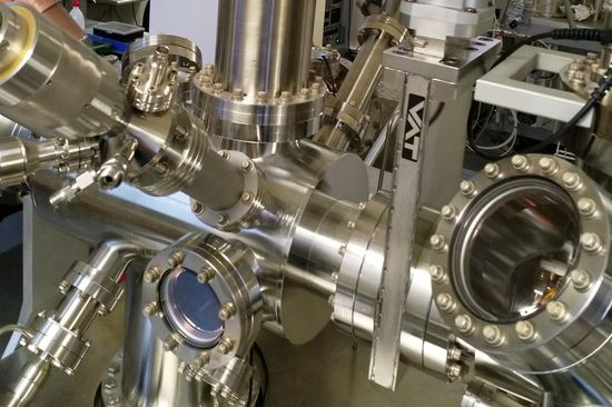 vacuum chambers with nuts and bolts and glass windows