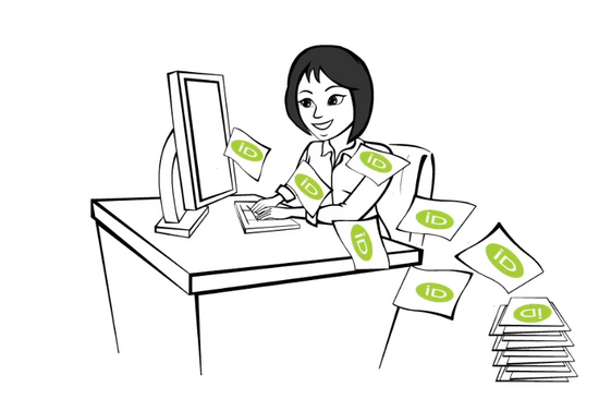 Women sits in front of a computer with ORCID logo