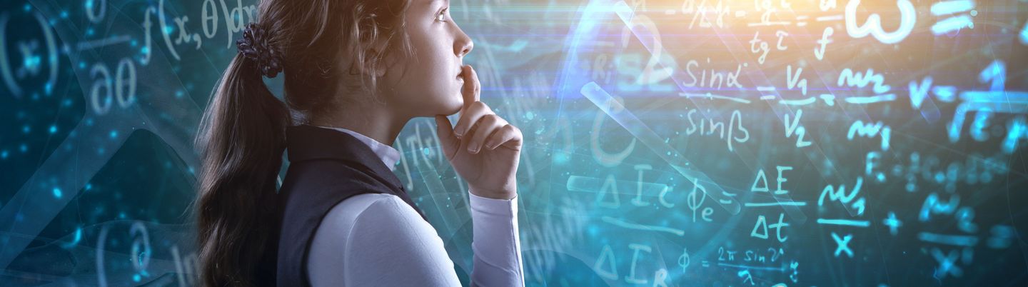 Student in front of the blackboard full with mathematic formulas 