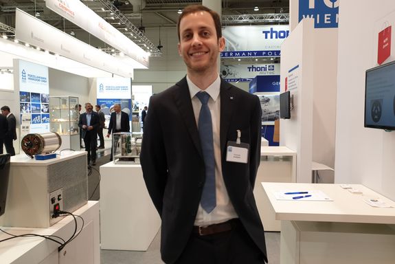 Dominik Wimmer (TU Wien) at the TU Wien stand.